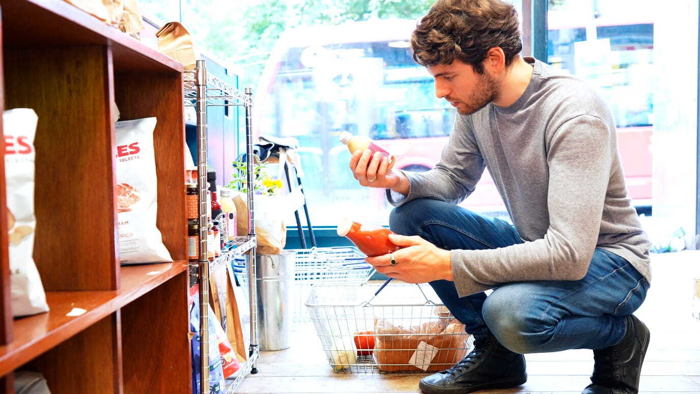 shopper-comparing-drinks